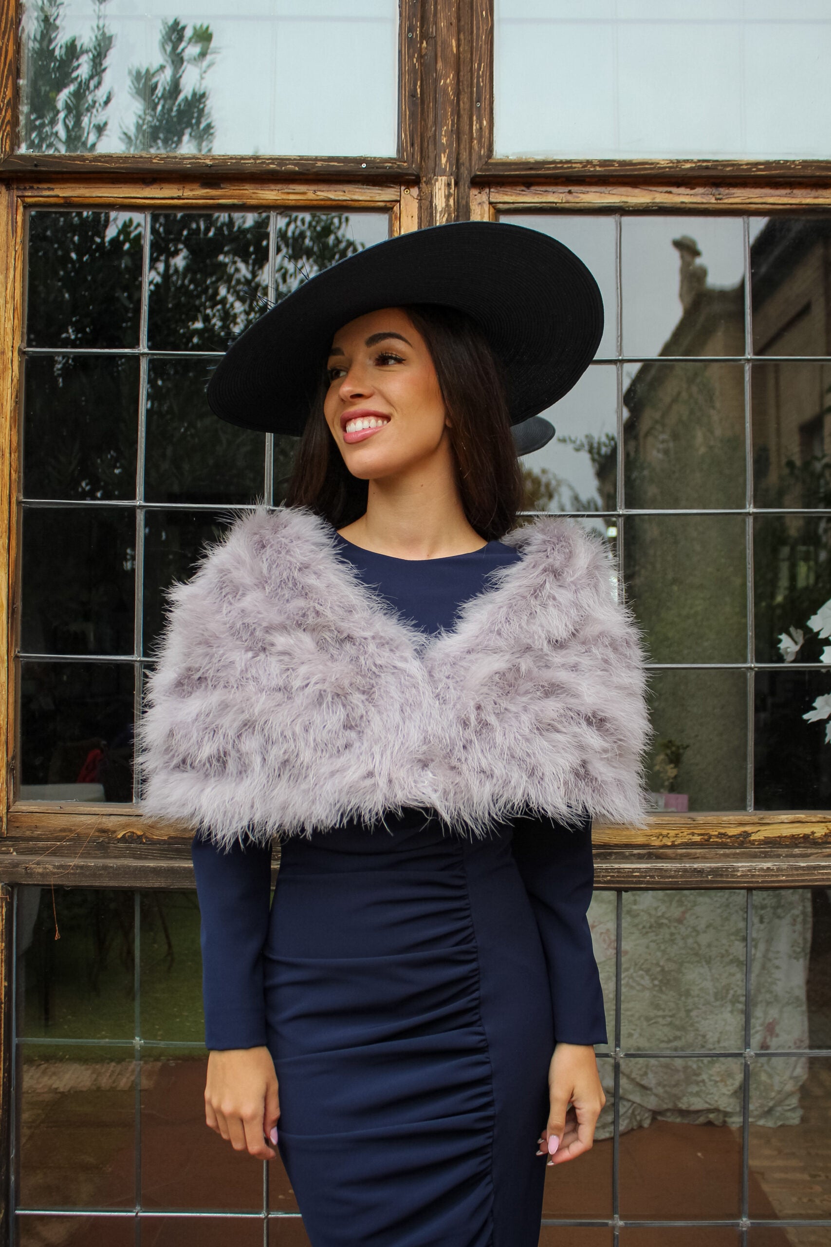 Capa de plumas Gris